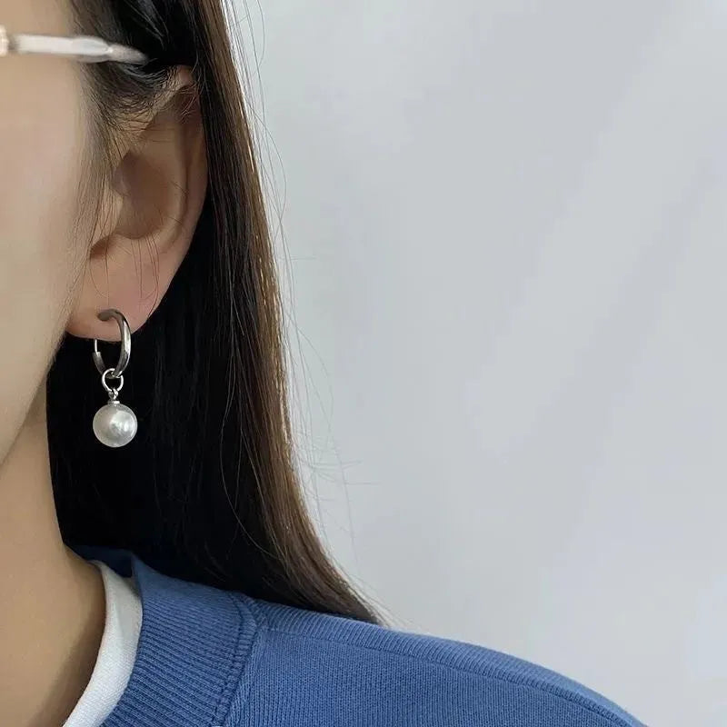 Women's geometric pearl earrings with alloy construction and titanium steel components