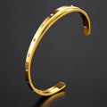 Open-ended stainless steel women's bracelet with electroplated finish and inlaid zircon crystals