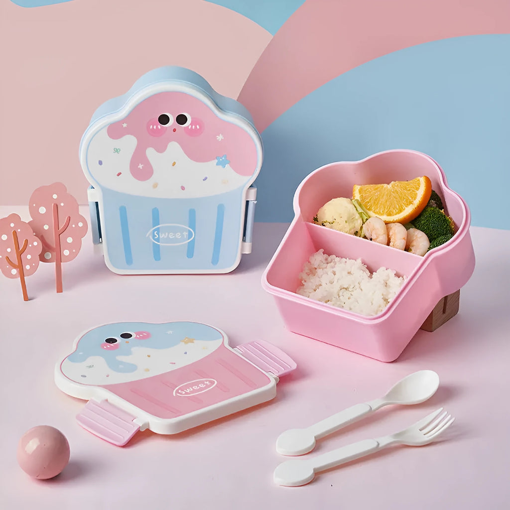 Pink and blue creative ice cream shaped plastic lunch box with spoon and fork on a table.