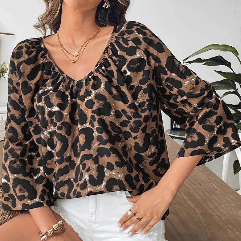 Women's leopard print polyester V-neck pullover top with half sleeves in multicolour