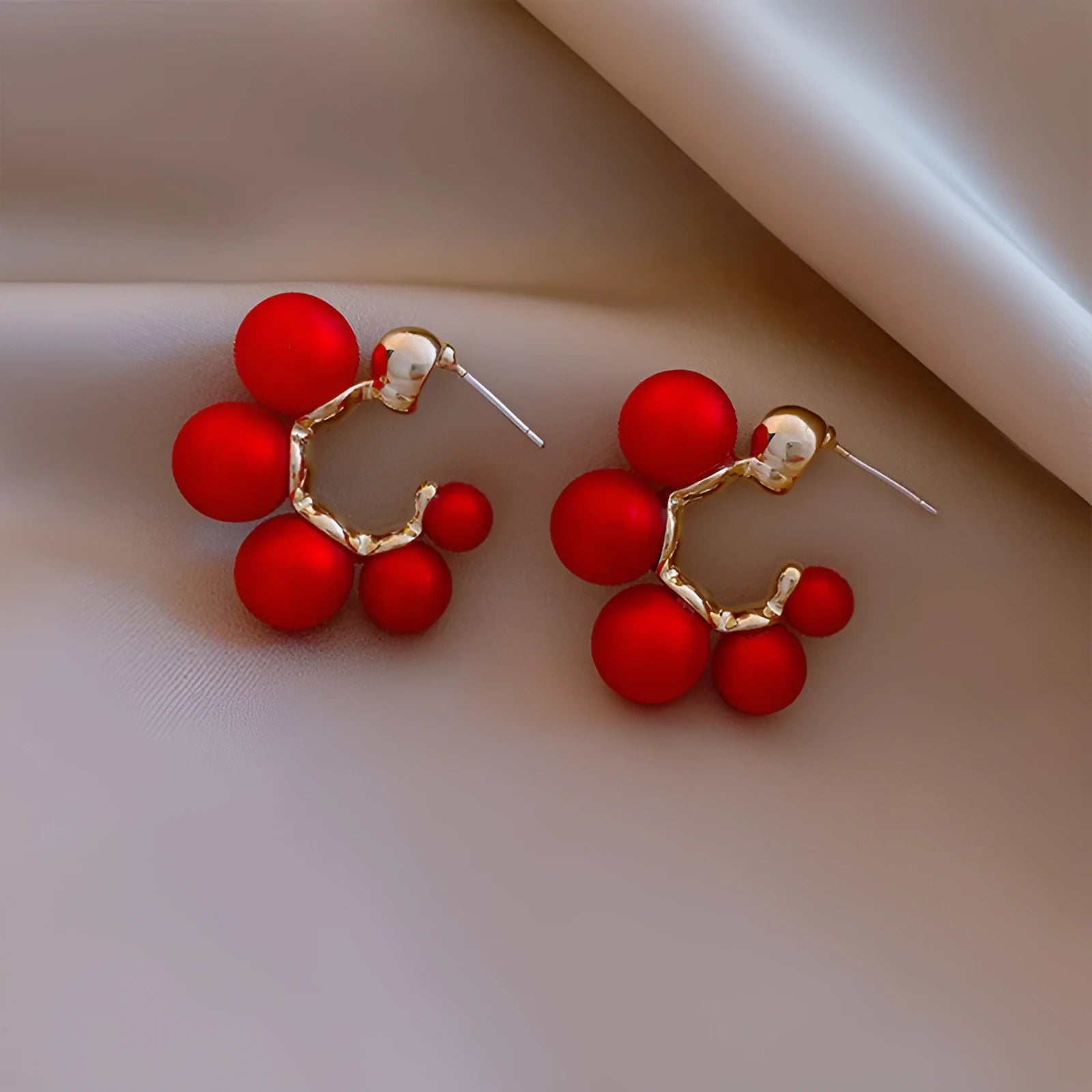 Red and white alloy bell earrings with hanging design for women