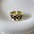 Adjustable copper ring with retro distressed geometry design and lines pattern.