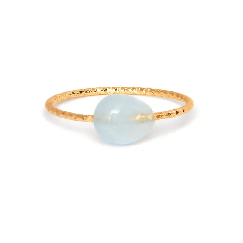 Geometric agate ring with coloured stone centrepiece showing original niche design for women