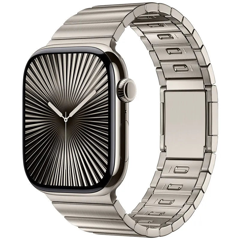 Stainless steel Apple Watch strap with magnetic buckle in silver colour.