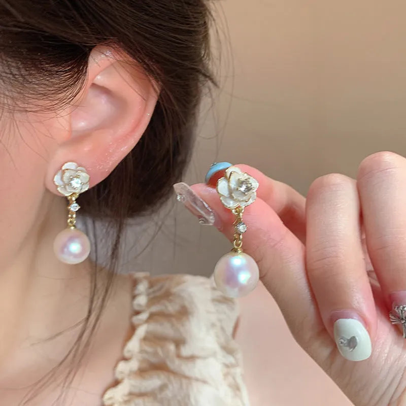 Camellia flower stud earrings with pearl detail in alloy metal for women