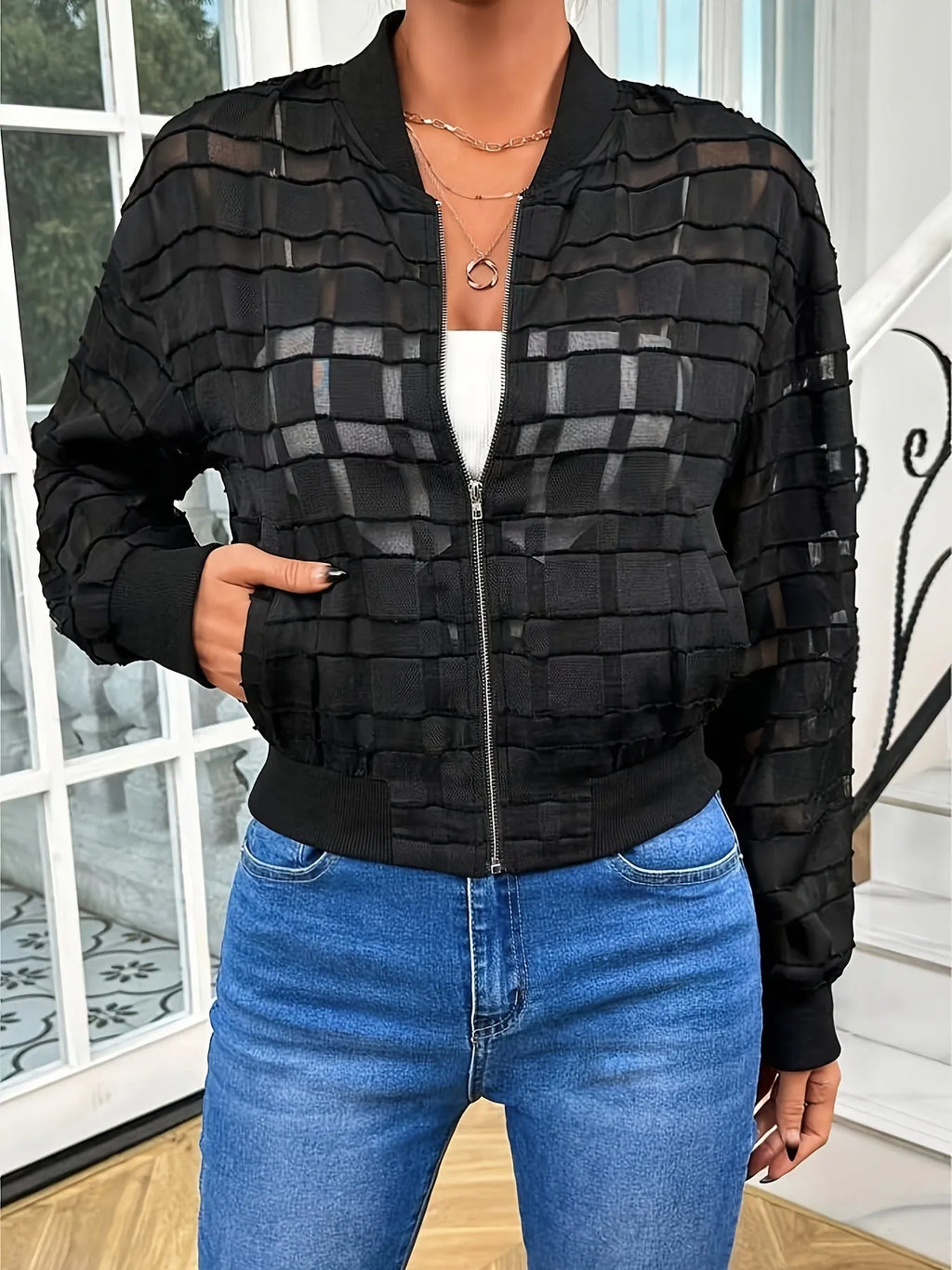 Black semi-transparent women's jacket with geometric pattern and front zipper