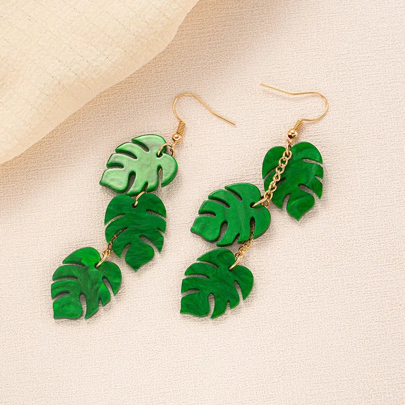 Drop earrings with acrylic coconut and artocarpus fruit charms on alloy hooks in summer colours