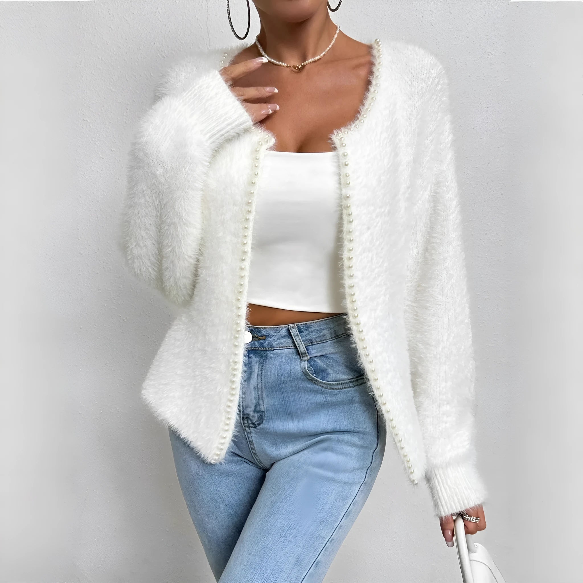 White women's V-neck cardigan sweater with medium thickness and standard length