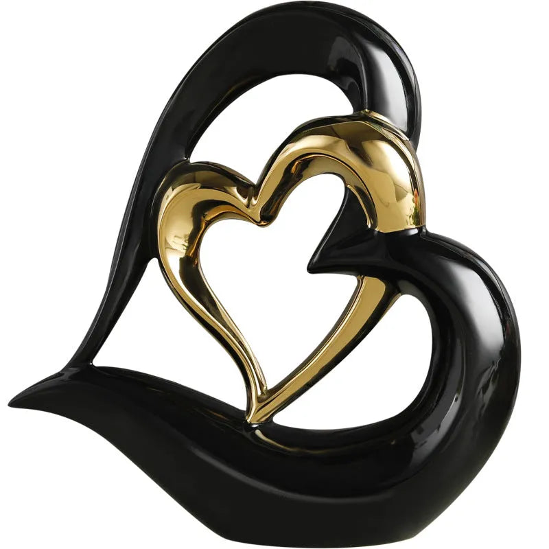 White porcelain love heart ornament in modern geometric style with 1939 Black Gold colour finish on shelf