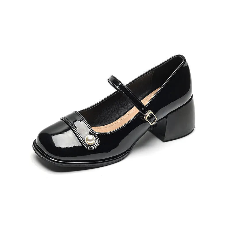 French style chunky heel ankle boots with patent leather upper, square toe, and buckle fastening