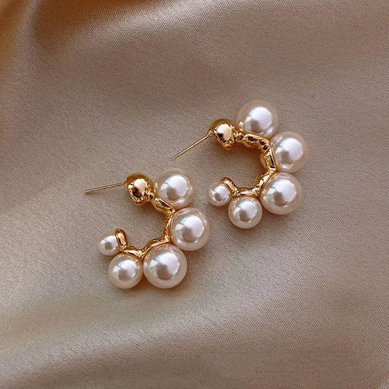 Red and white alloy bell earrings with hanging design for women