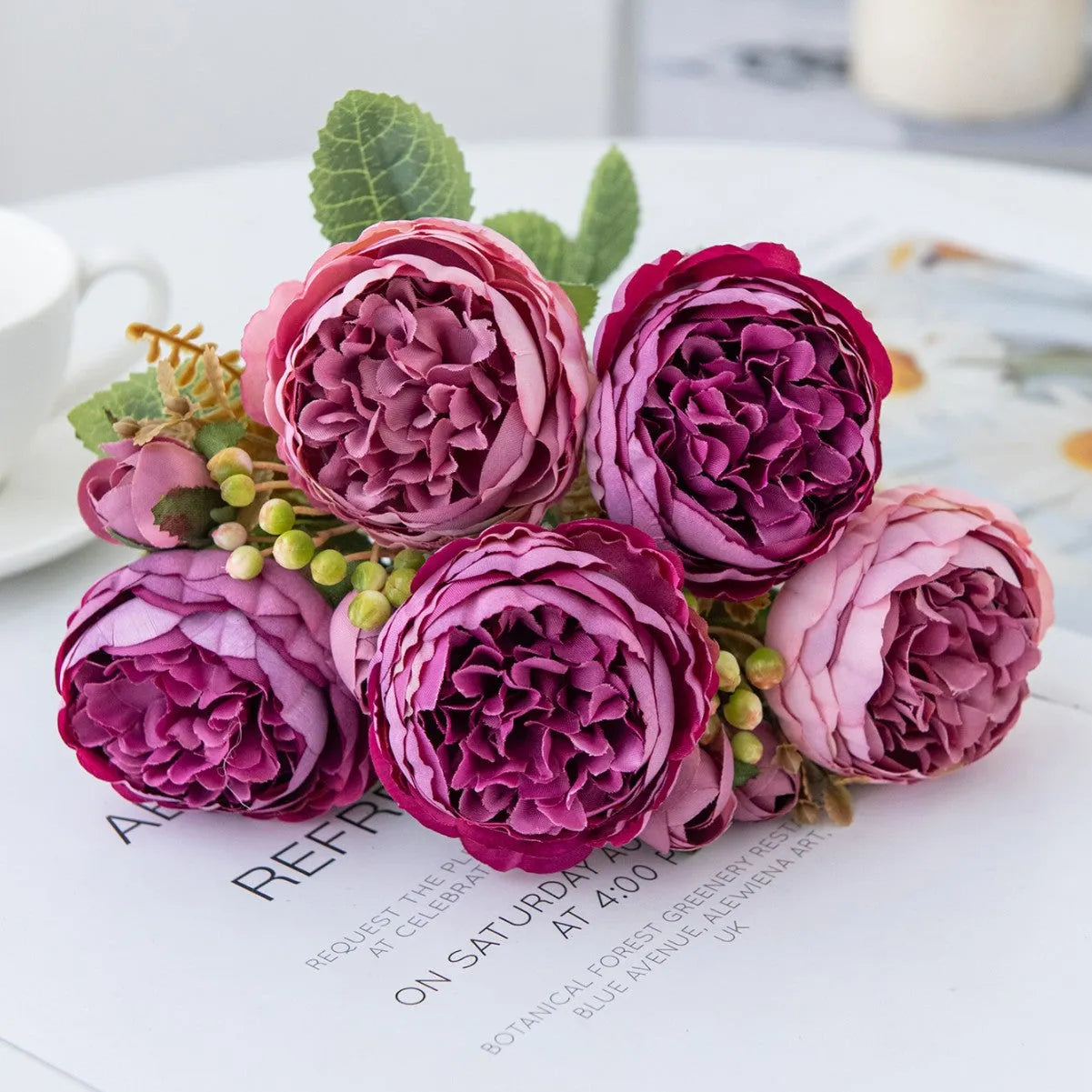 Silk artificial peony flower bouquet in champagne, pink, purple, sand red, or white for decoration.