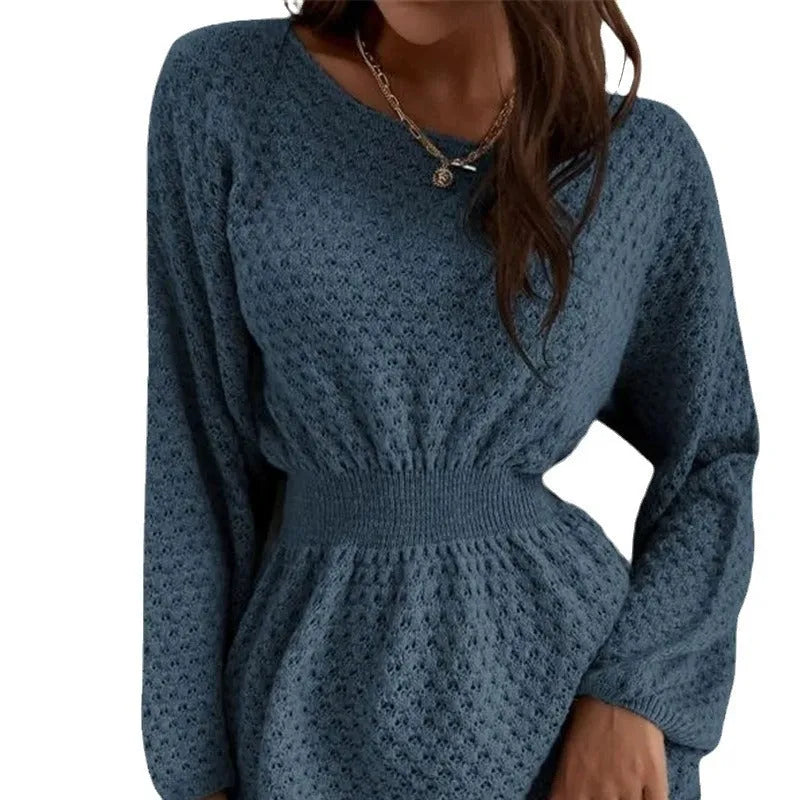 Blue women's knitted dress with hand-crocheted flower details and fitted waist