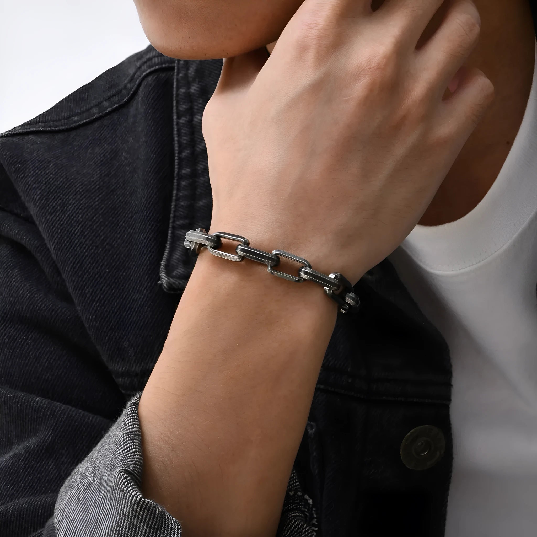 Men's simple square chain bracelet in titanium steel showing steel, gold, black, and retro colour options.