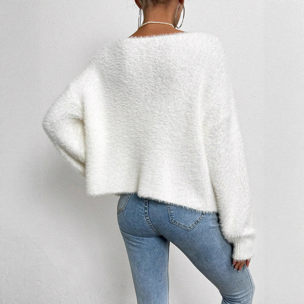 White women's V-neck cardigan sweater with medium thickness and standard length