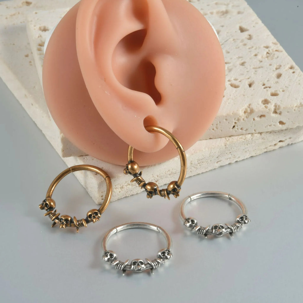 Copper punk earrings with ghost head design in ancient silver finish