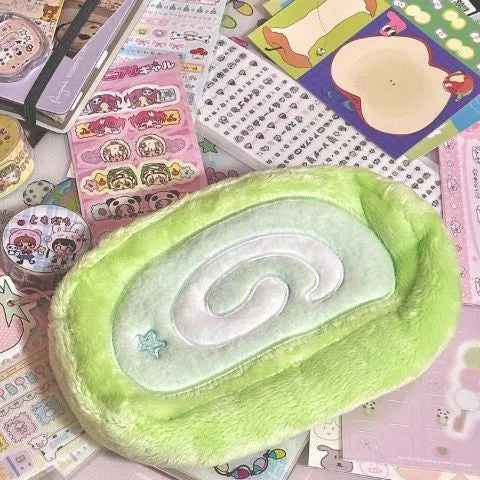 Velvet Swiss roll cake design pencil case in roll-up format for stationery storage