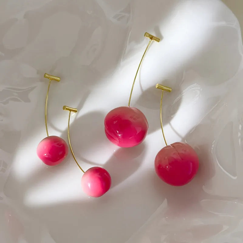 Acrylic peach fruit earrings with silver-tone copper posts in small and large size options
