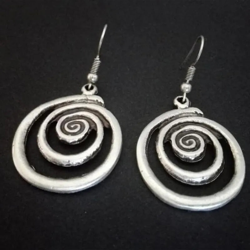 Silver geometric spiral distressed earrings with retro national style design measuring 2.6*5cm