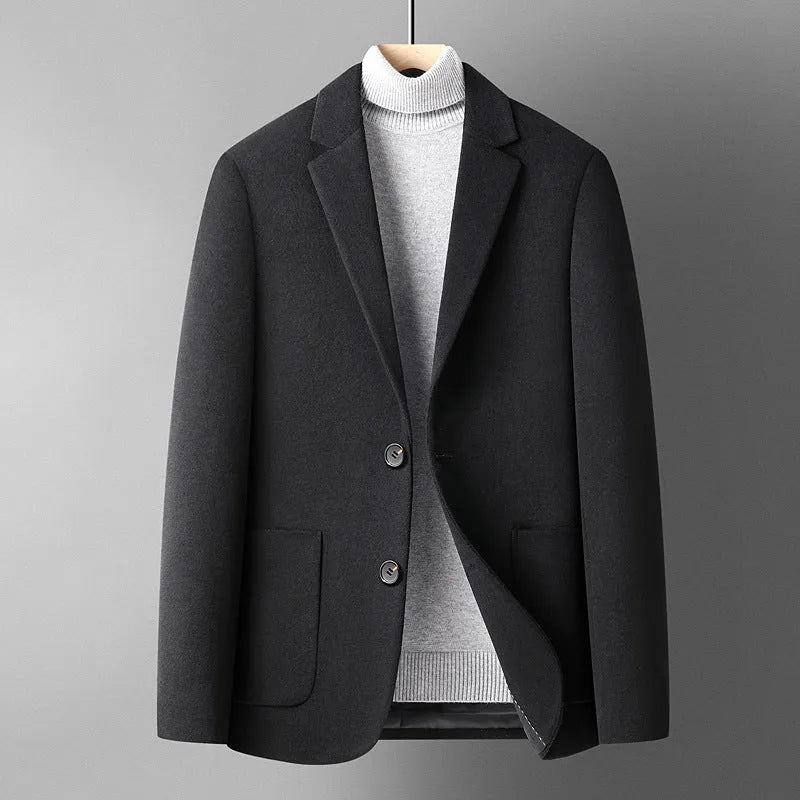 Men's slim fit wool suit jacket in a grey colour, showing the tailored silhouette and front button closure.