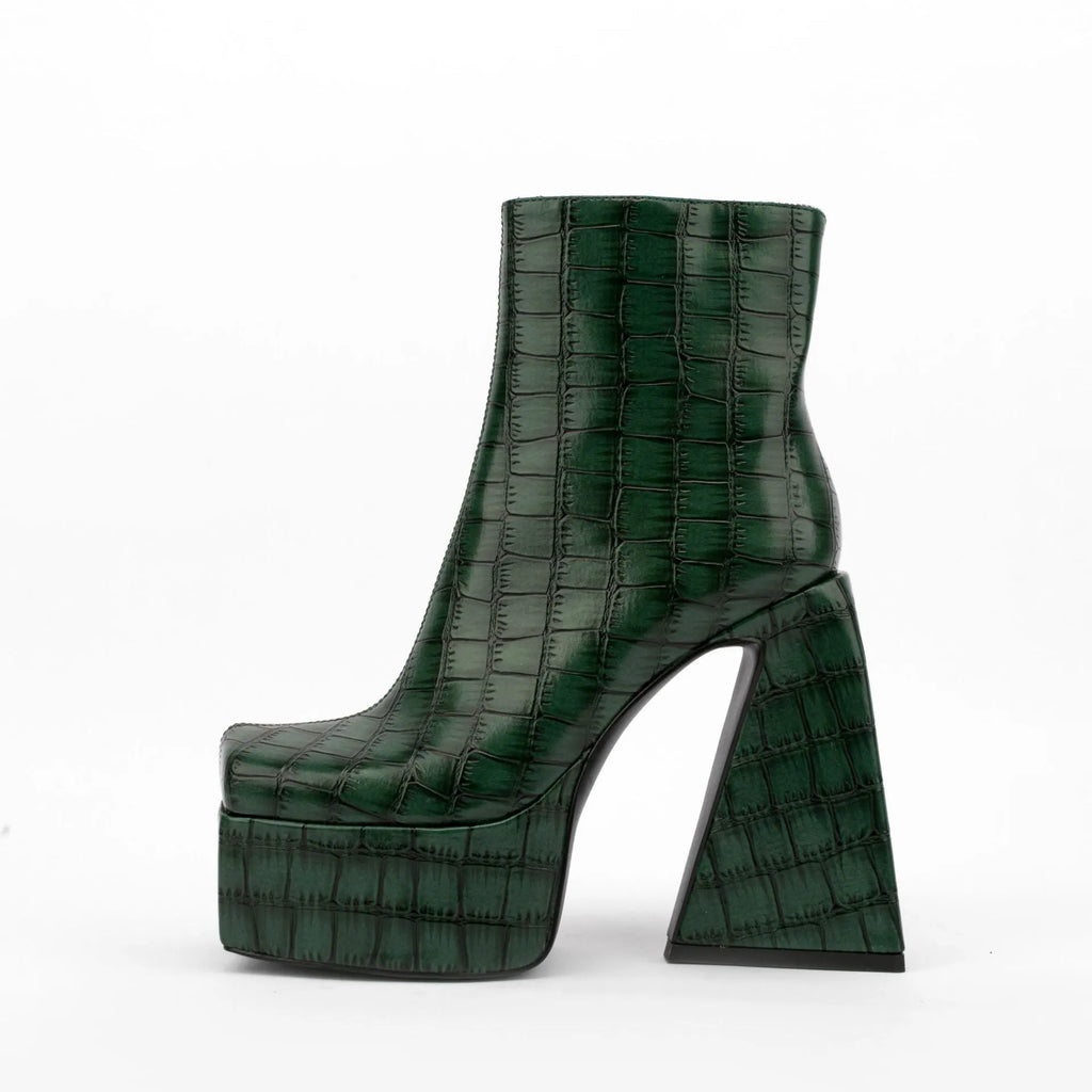 Women's ankle boot with a high heel, shown in a solid colour, made from artificial PU leather.