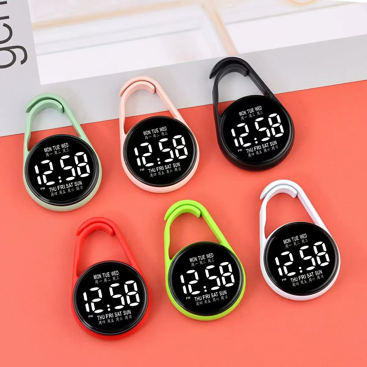 LED digital watch with luminous display and plastic strap in one of ten colour options on a wrist.