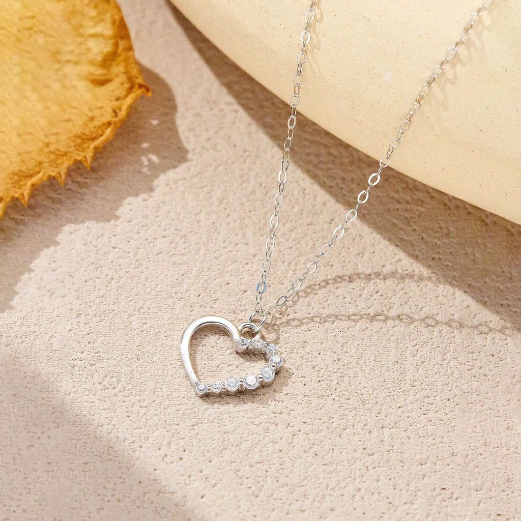 S925 sterling silver hollow heart necklace for women with regular chain available in white gold colour