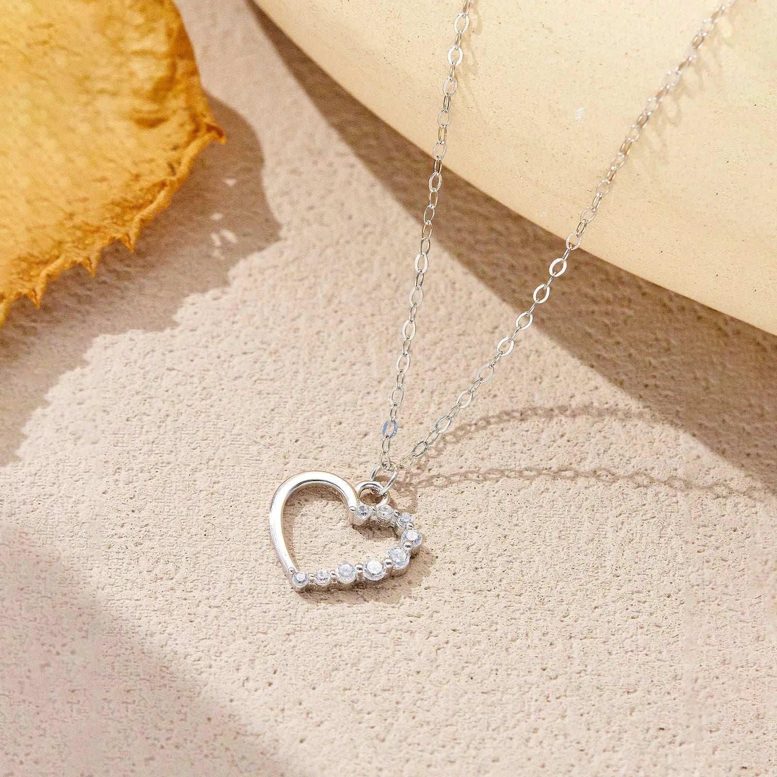 S925 sterling silver hollow heart necklace for women with regular chain available in white gold colour