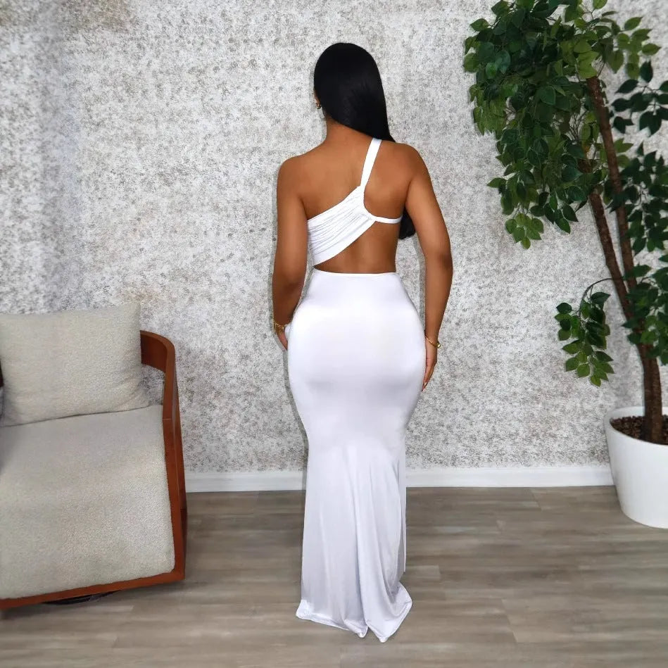Women's solid colour long one-shoulder pleated dress in milk silk fabric, shown on a model.