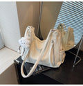 Women's soft PU backpack in four colour options with matching pendant