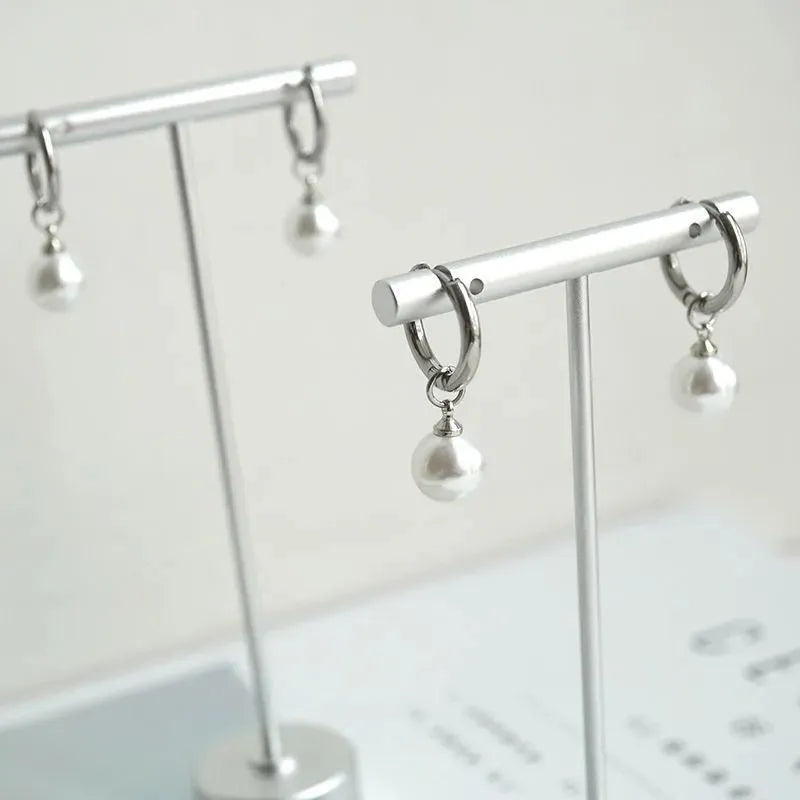 Women's geometric pearl earrings with alloy construction and titanium steel components