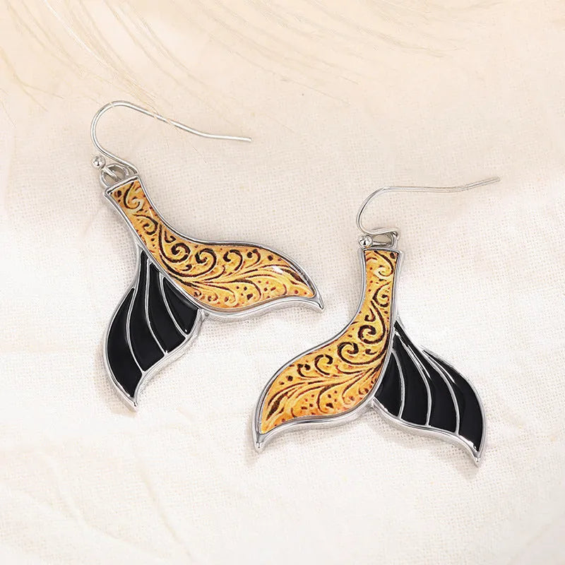 Women's fishtail earrings with whale design in white gold alloy finish