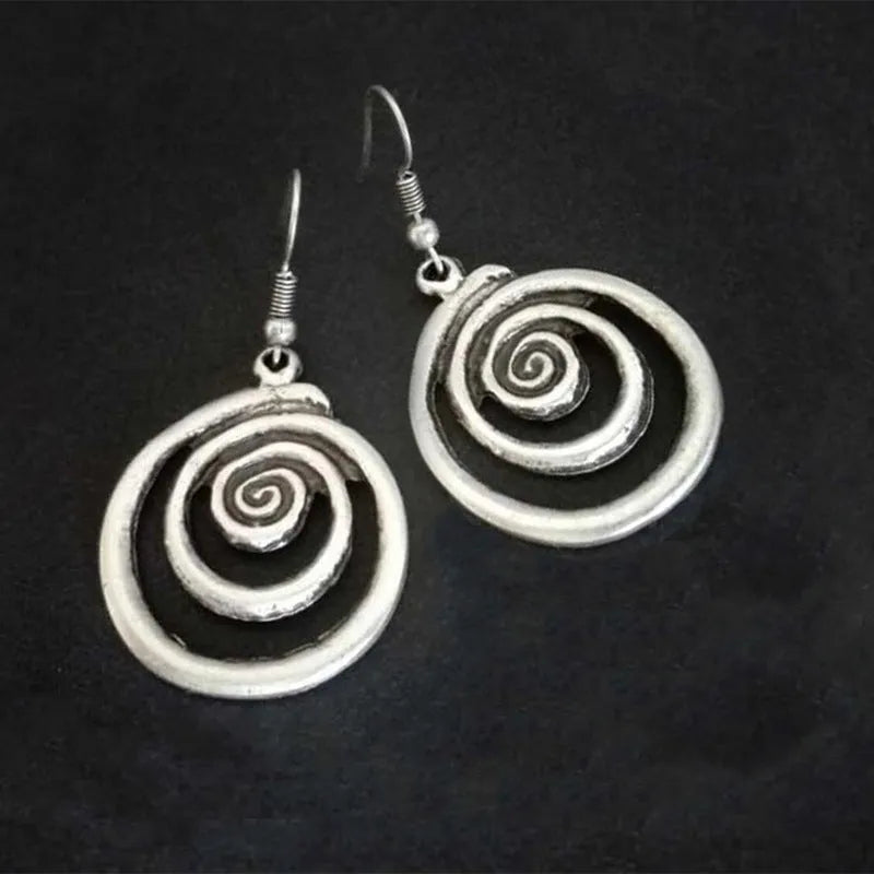 Silver geometric spiral distressed earrings with retro national style design measuring 2.6*5cm