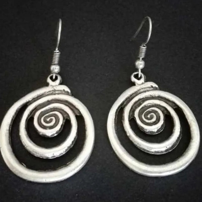 Silver geometric spiral distressed earrings with retro national style design measuring 2.6*5cm
