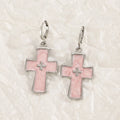 Women's alloy earrings showing cross, heart, and animal designs in white, black, and silver colour variations