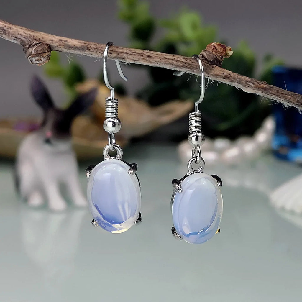 Moonlight white opal drop earrings with retro moonstone design and elliptical elements