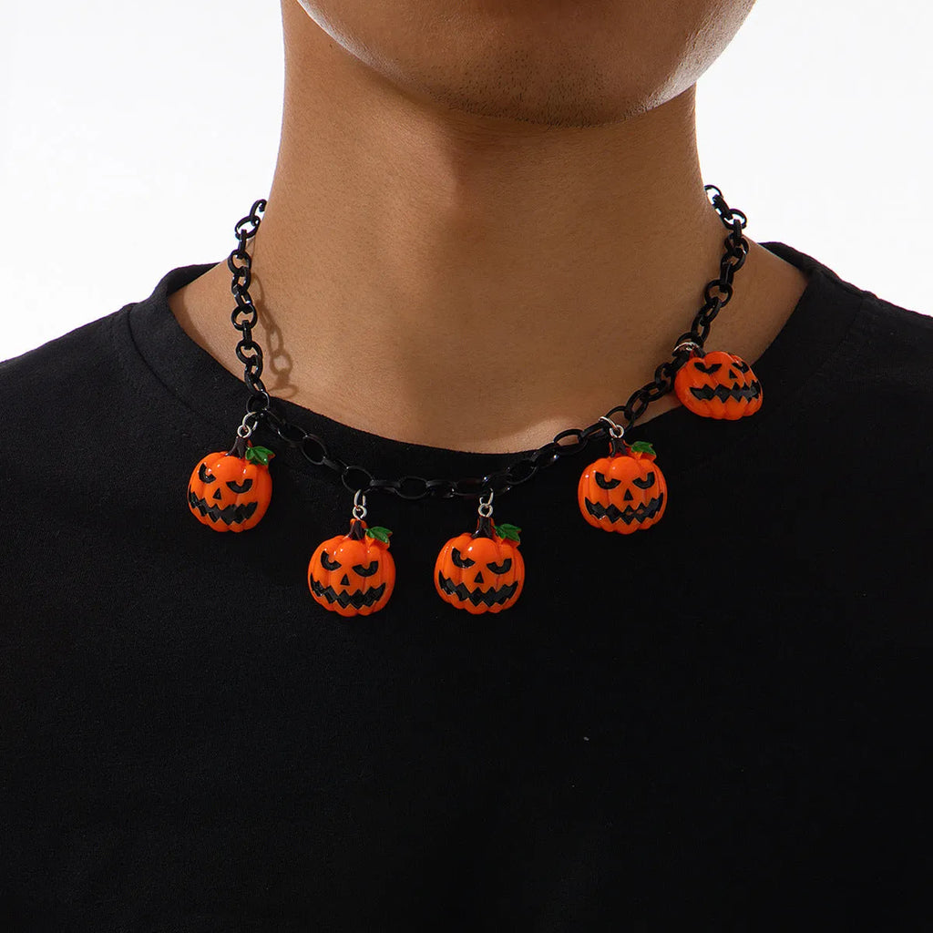 Halloween necklace with acrylic ghost and pumpkin pendant in mixed colours on regular chain