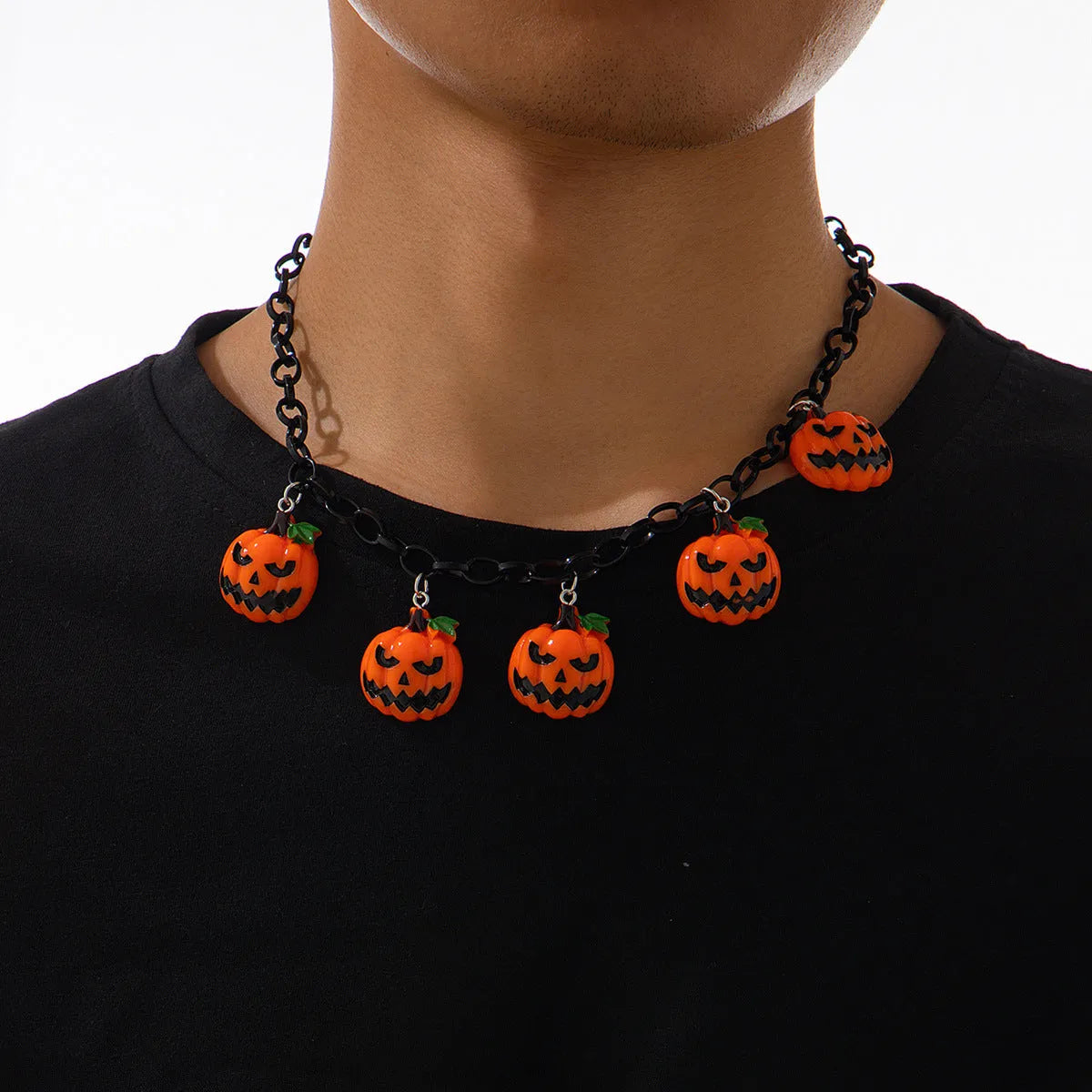 Halloween necklace with acrylic ghost and pumpkin pendant in mixed colours on regular chain