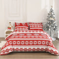 Winter Sleepers pattern three-piece bedding set in red on a bed