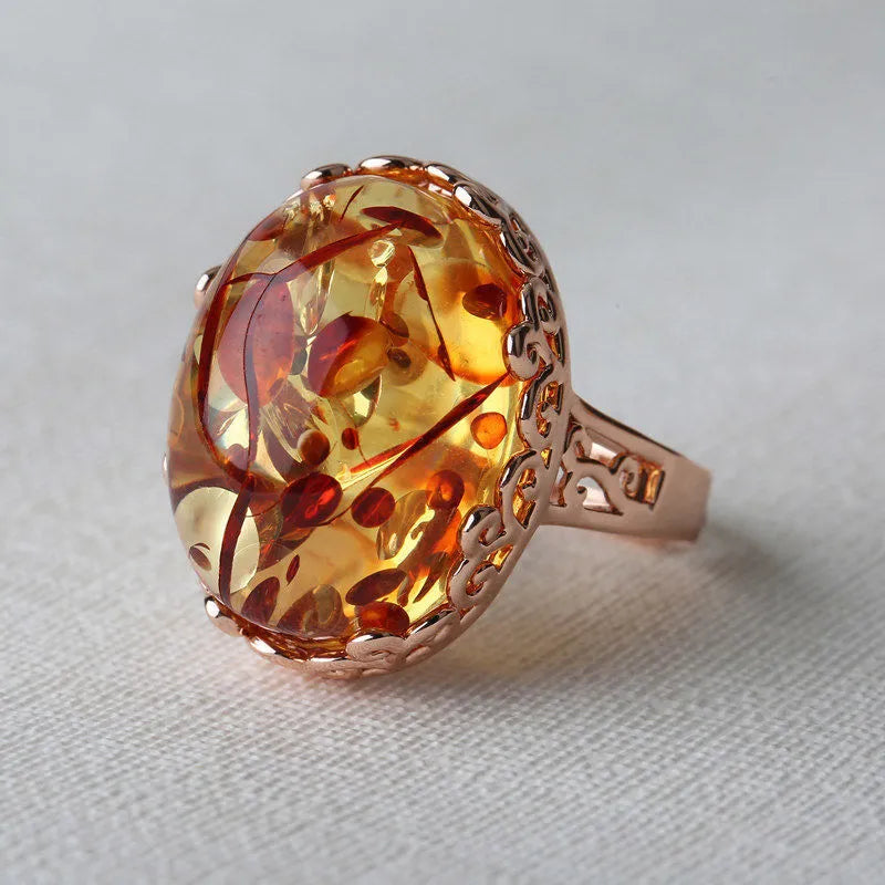 Amber beeswax ring with new amber type A colour and alloy band in ethnic retro style