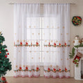 A pair of white polyester curtains with embroidered red Christmas snowflakes in an American style.