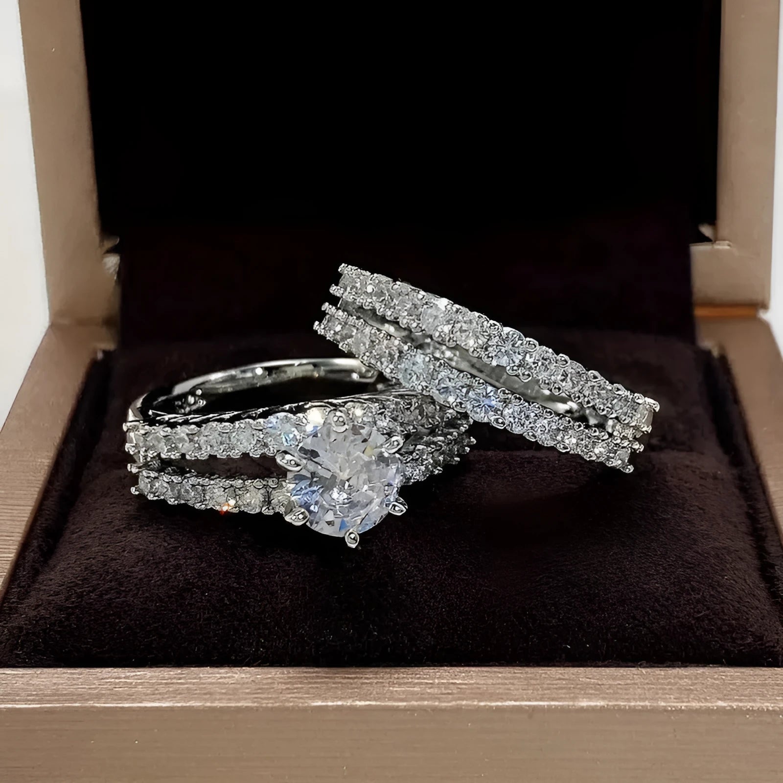 Two interchangeable geometric fashion rings with fully-jewelled round elements in gold, rose gold or silver colours