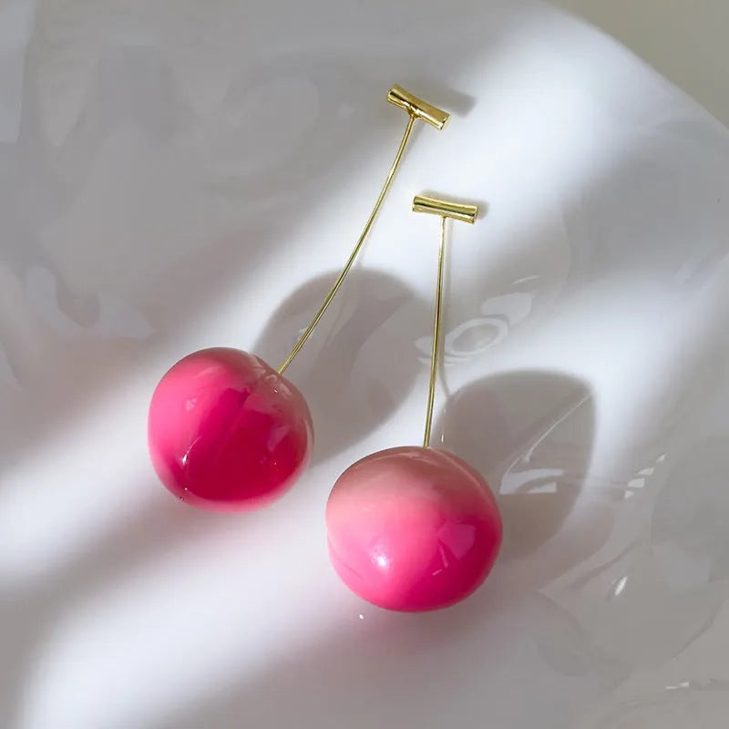 Acrylic peach fruit earrings with silver-tone copper posts in small and large size options