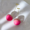 Acrylic peach fruit earrings with silver-tone copper posts in small and large size options