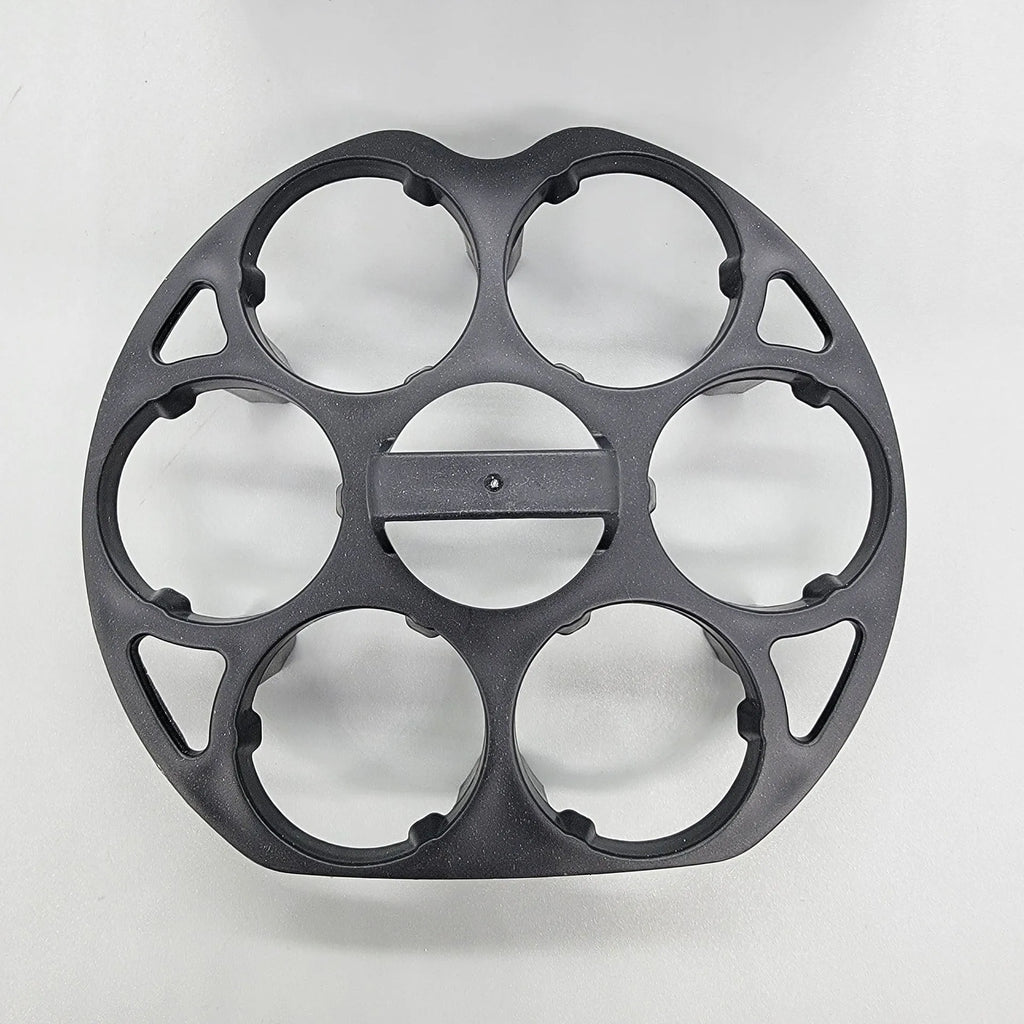 Black plastic egg holder rack with individual compartments measuring 13.8cm wide