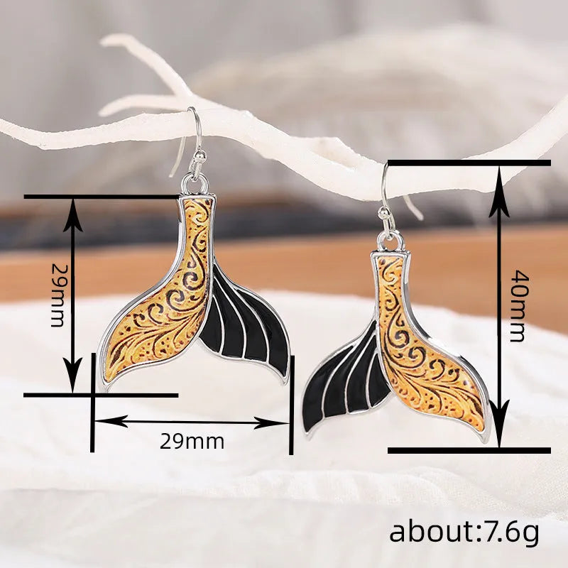 Women's fishtail earrings with whale design in white gold alloy finish
