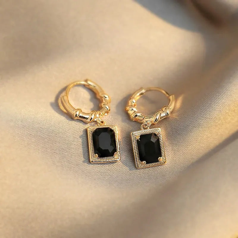 Geometric quadrilateral copper earrings with black zircon stones in French court retro style