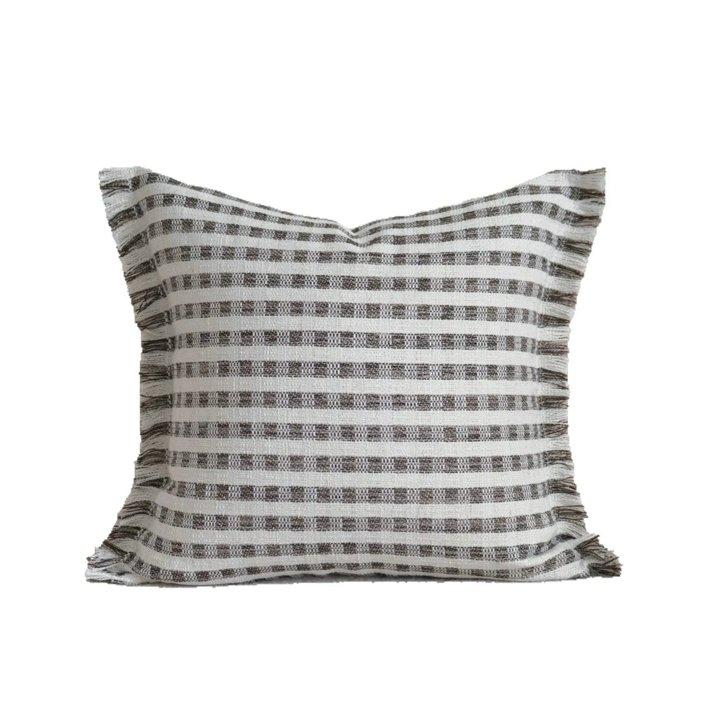 Coffee brown striped decorative cushion on a sofa in Chinese classical mid-century modern style.