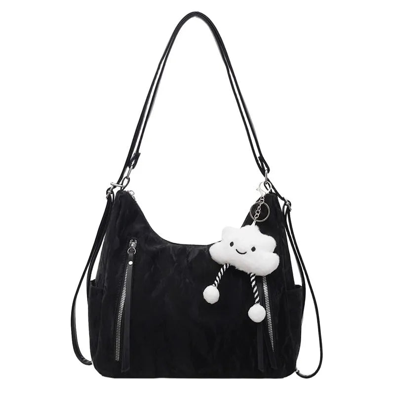 Women's soft PU backpack in four colour options with matching pendant