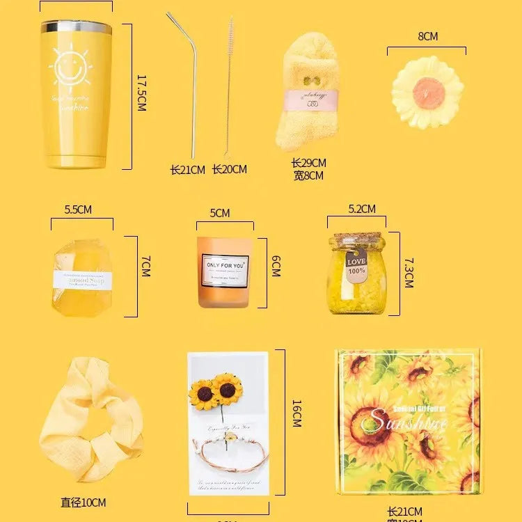 Boxed aromatherapy candle gift set with various modern soy wax designs including pink and sunflower themes.